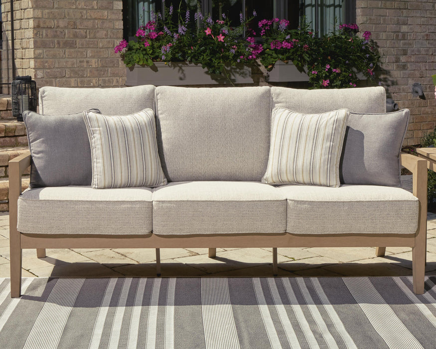 Hallow Creek Outdoor Sofa with Cushion - Furniture Source (IA) 