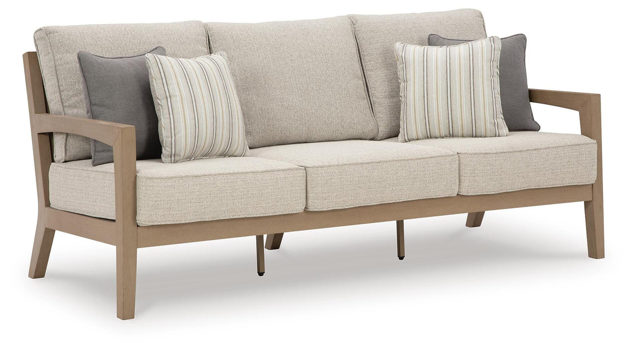Hallow Creek Outdoor Sofa with Cushion - Furniture Source (IA) 