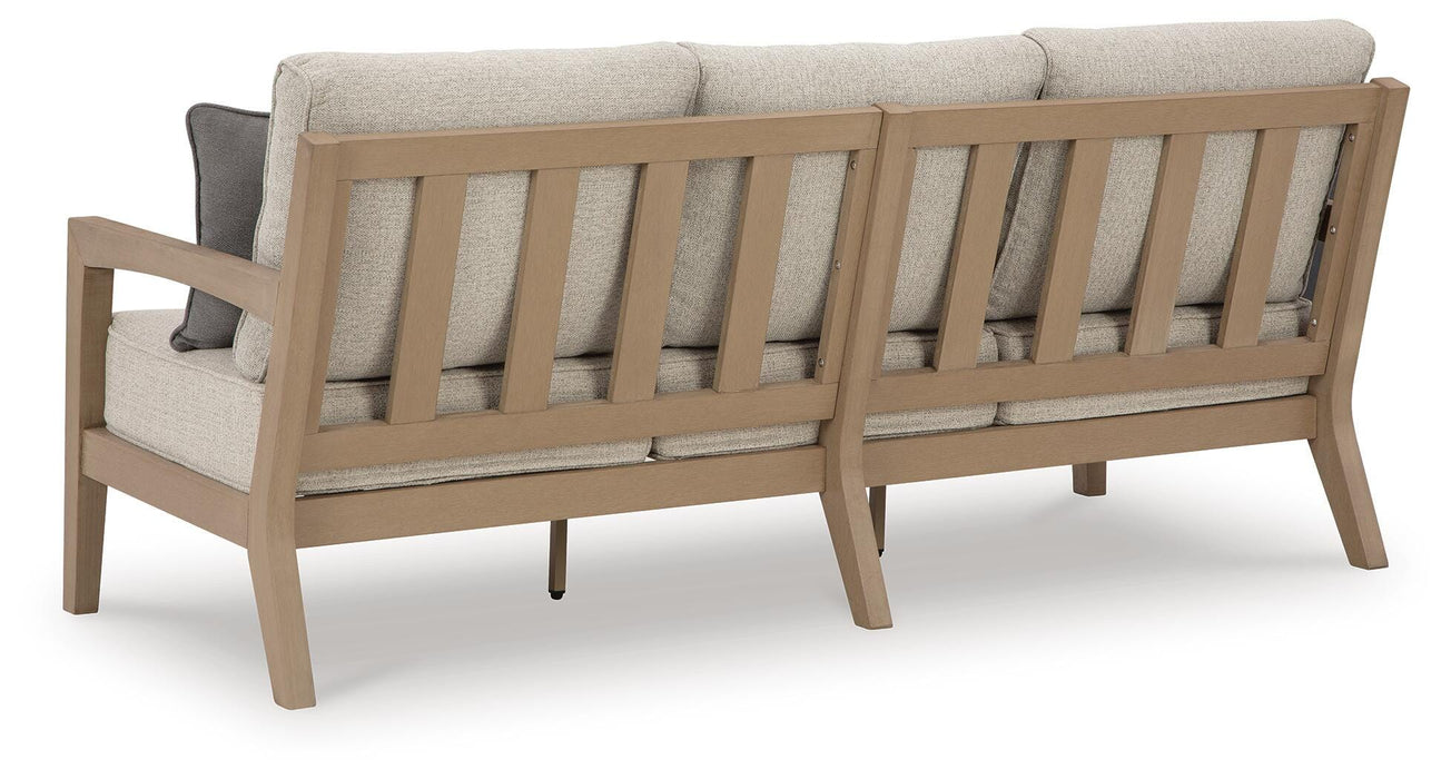 Hallow Creek Outdoor Sofa with Cushion - Furniture Source (IA) 