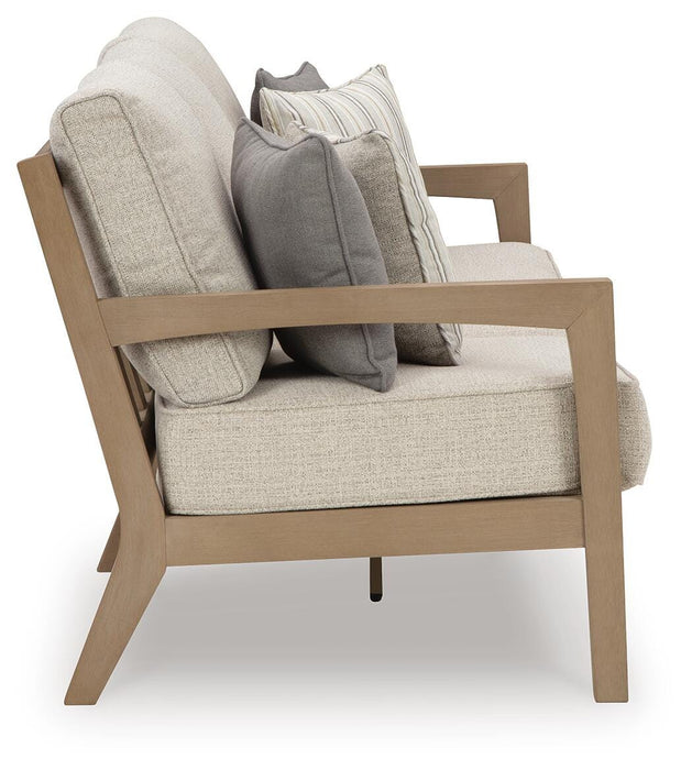 Hallow Creek Outdoor Sofa with Cushion - Furniture Source (IA) 